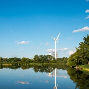 Windmill overlooking a lake