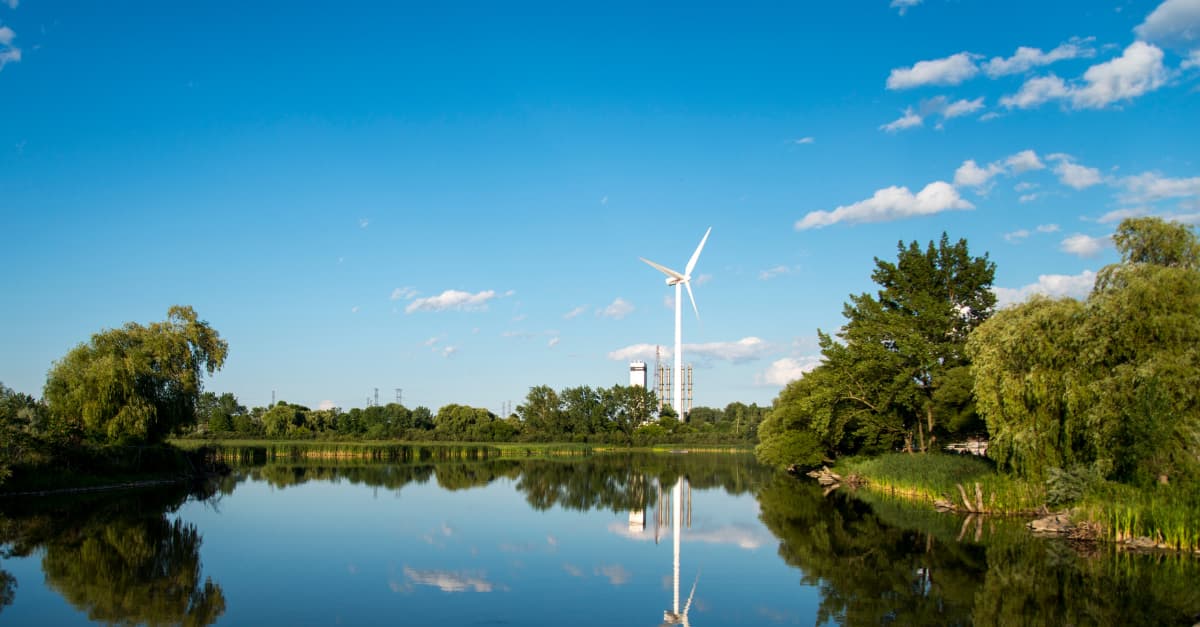 Windmill overlooking a lake